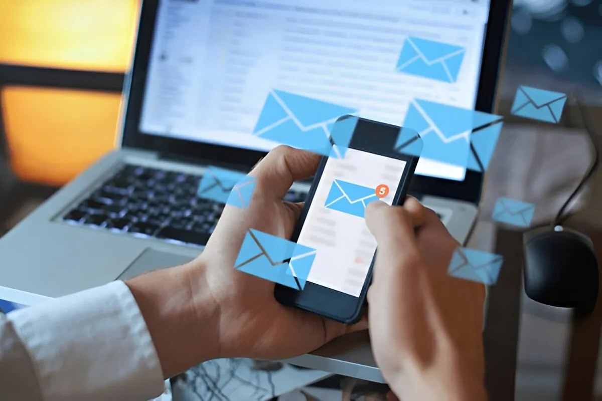 How to Write a Cold Email to a Recruiter in CS Job seeker writing a cold email to a tech recruiter on laptop